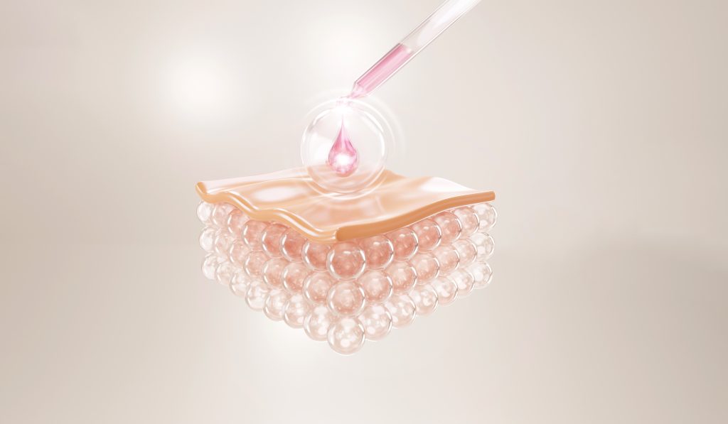 bottle liquid is being poured into tube pink liquid